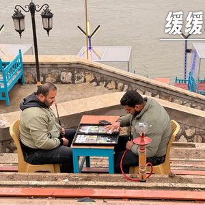 266 |中东| 缓缓的巴格达 - 弹匣、烤鱼、一个青年和穆塔纳比街的书摊