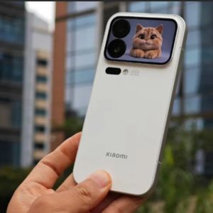 外刊精讲 | 4499元起的小米17 Pro Max 亮相：是“抄”还是“超”？能打败苹果吗？