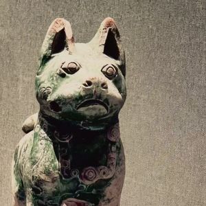 东汉绿釉陶狗：穿越千年的忠诚守护者